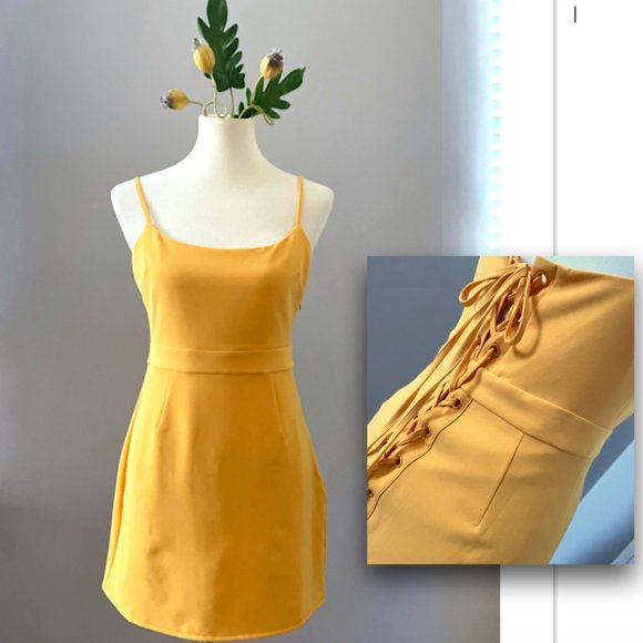 NBD Dresses & Skirts - Mustard Lace Up Back Dress